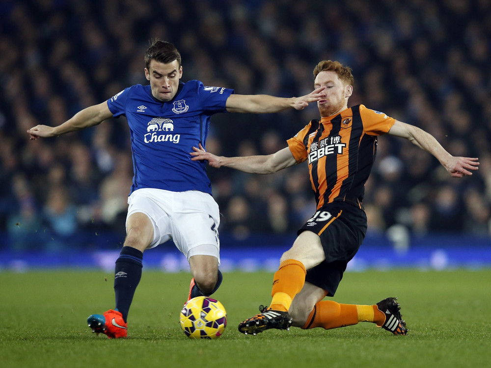 Everton's Coleman challenges Hull City's Quinn during their English Premier League soccer match at Goodison Park in Liverpool