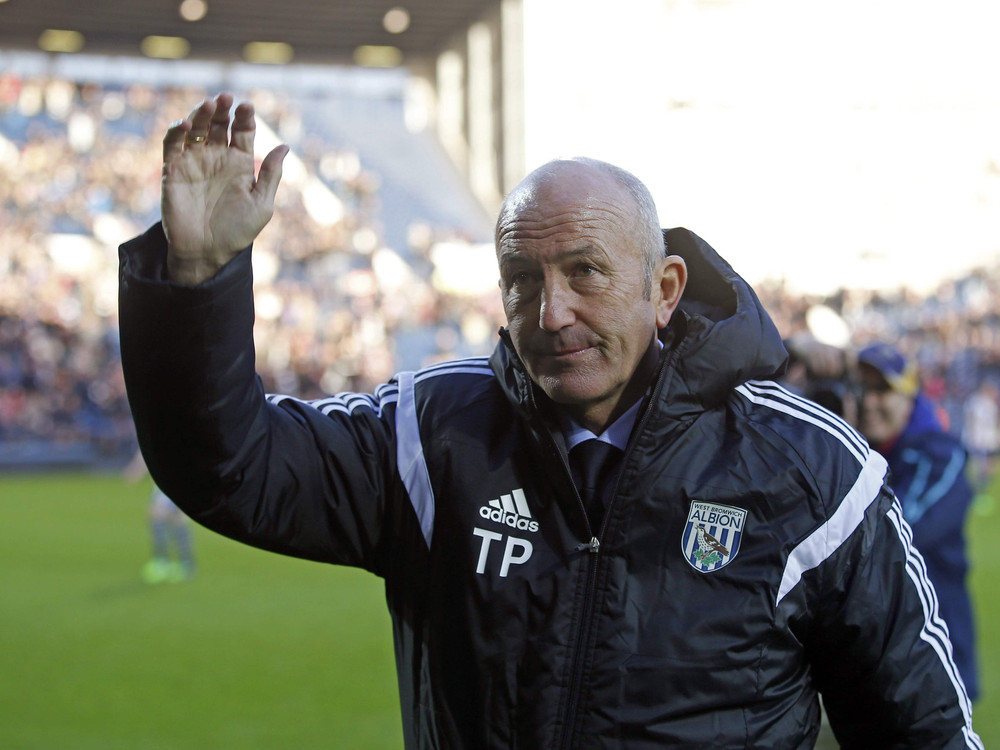 West Bromwich Albion's new manager Tony Pulis salutes the supporters before their English FA Cup third round soccer match against Gateshead in West Bromwich