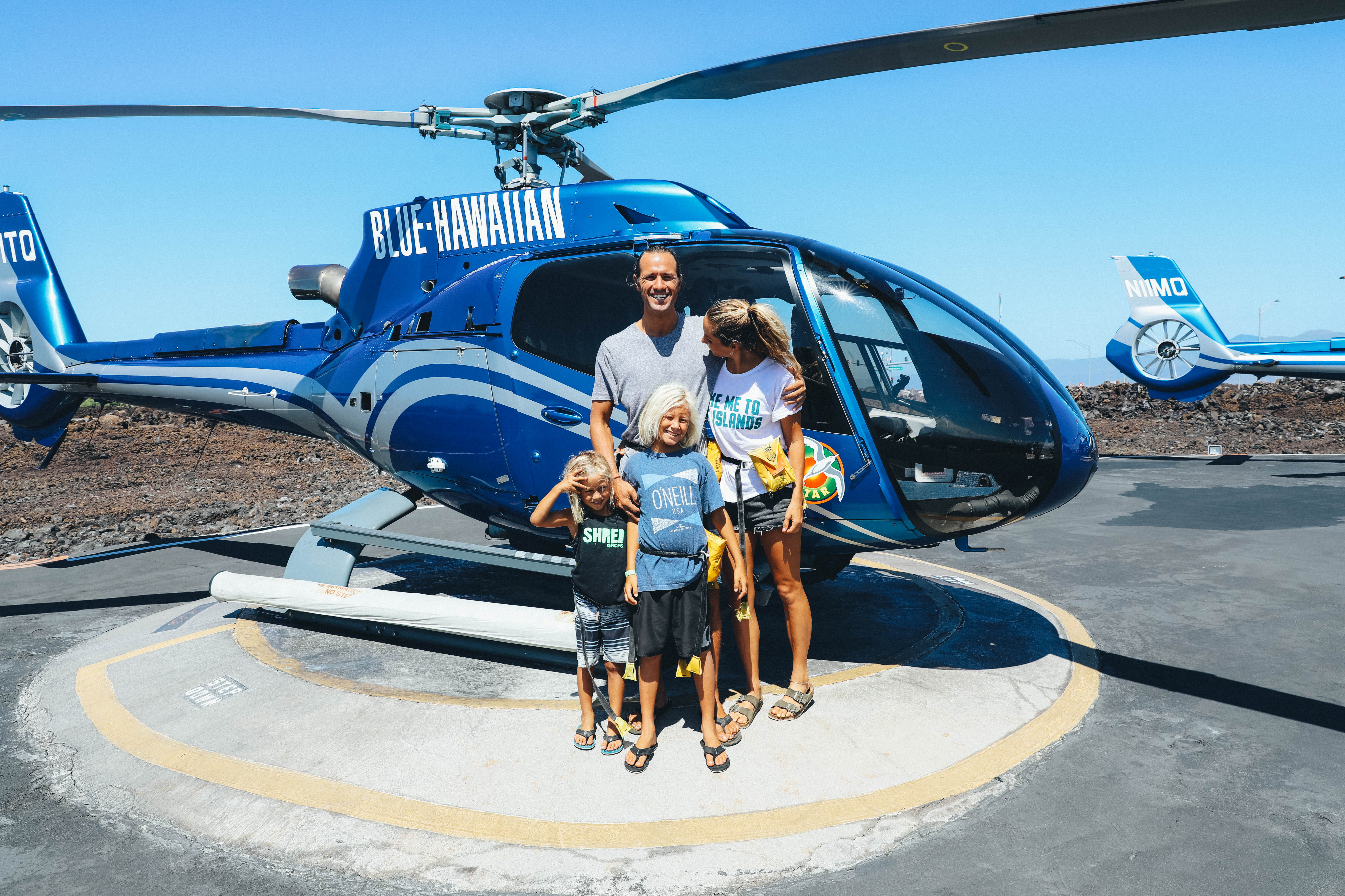 andy and family in front of helicopter for tour