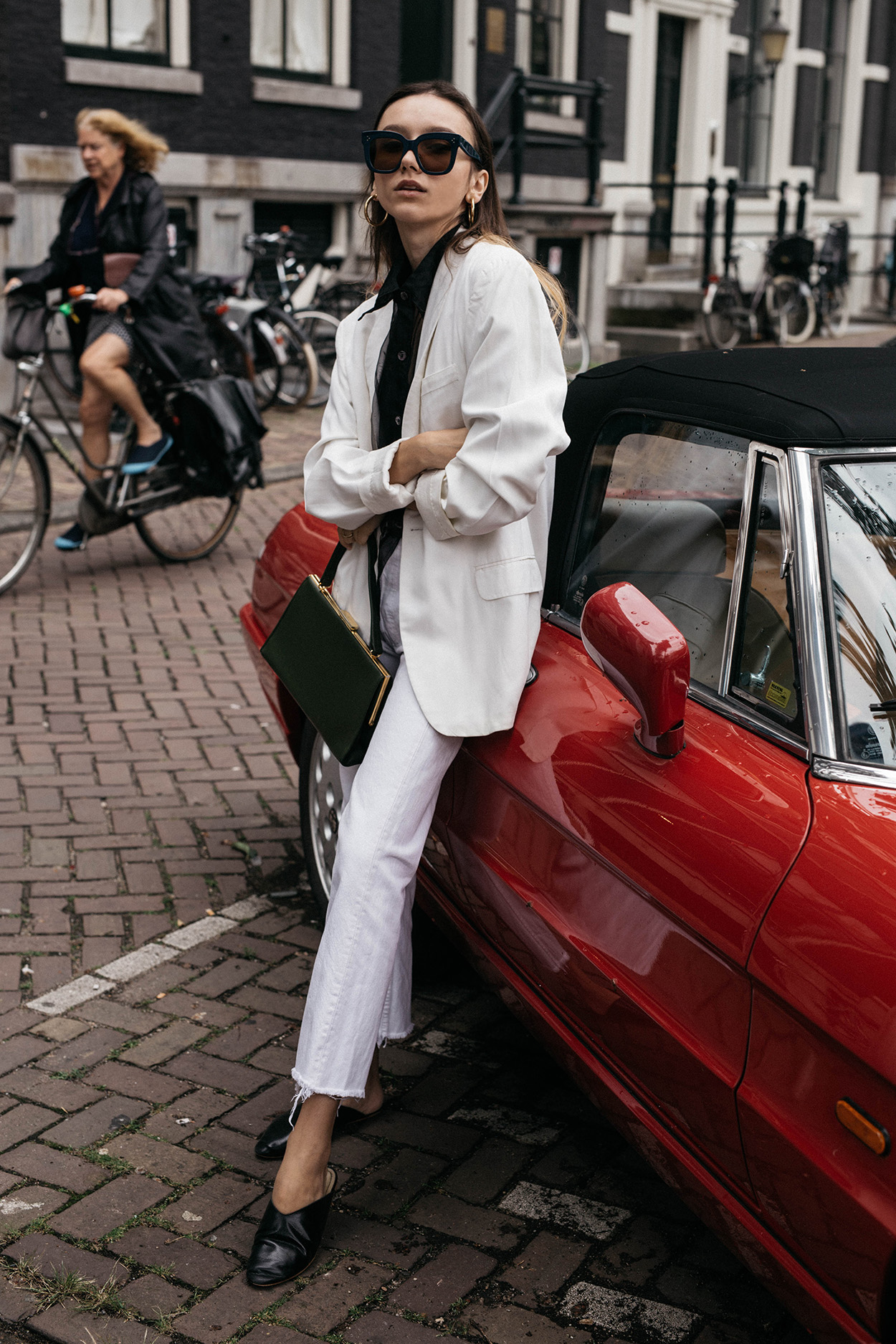 White-masculine-blazer-celine-audrey-sunglasses-green-clasp-bag-white-vintage-levis-straight-leg-jeans-black-mules-trend-2017-chic-outfit-ideas-3.jpg